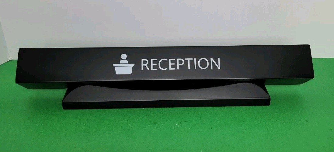 Heavy 16.5″ Solid Resin Reception Desk Sign – Sturdy Slanted Name & Icon