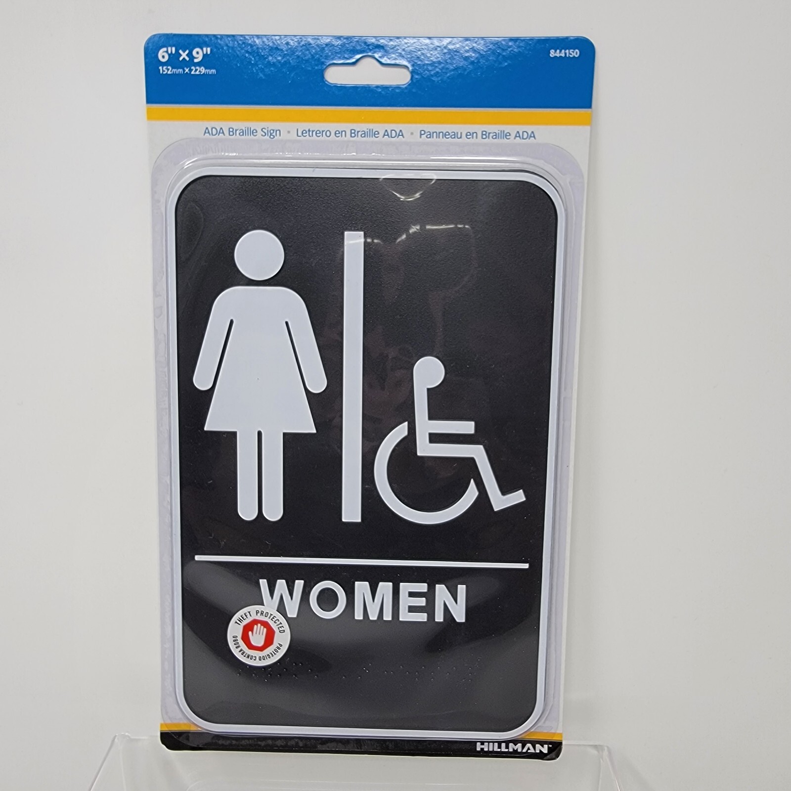 Hillman Group Women Accessible ADA Braille Sign 6″ x 9″ Self Adhesive Plastic