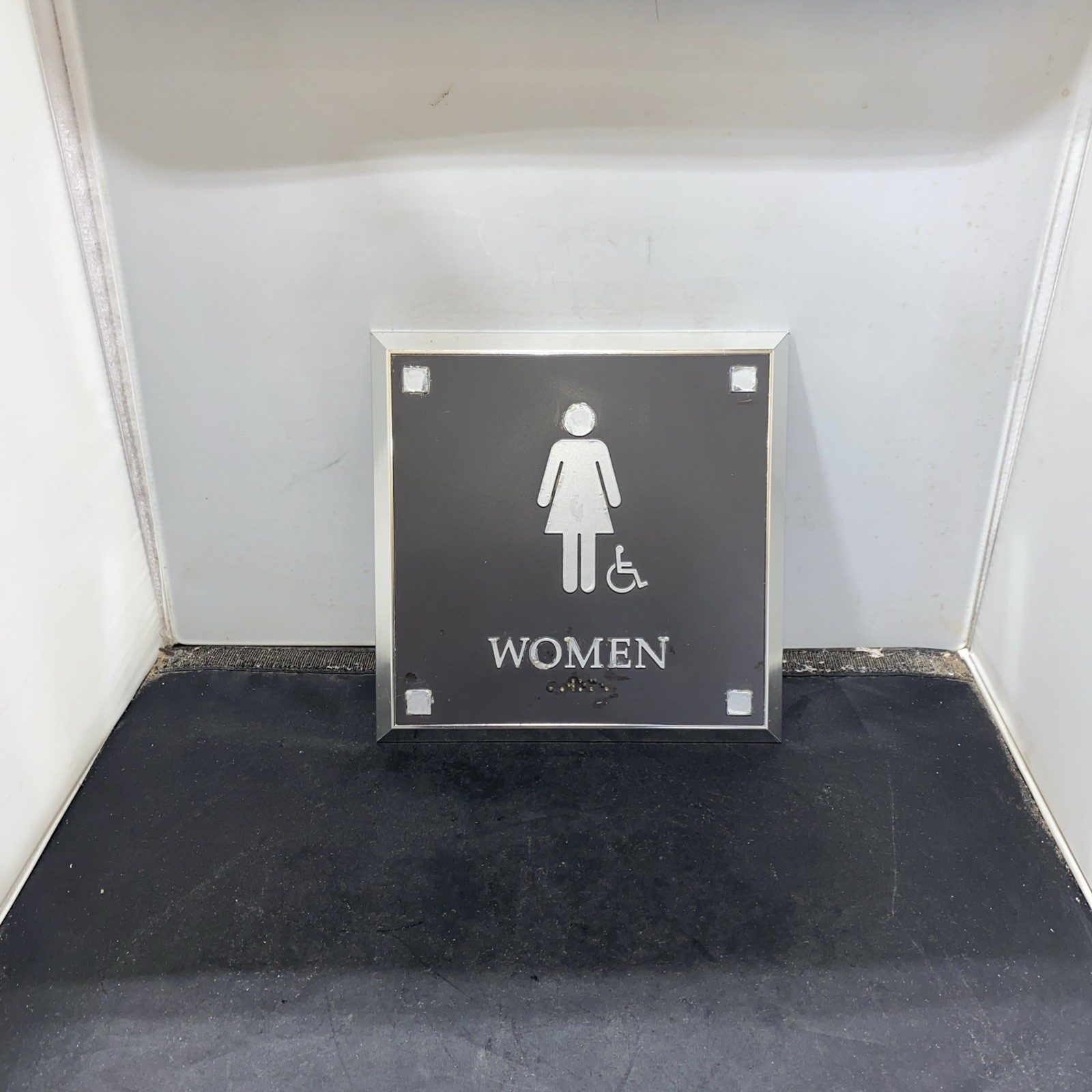 ADA Compliant Women’s Room Sign Self-Adhesive ABS Plastic Metal Braille 9″ X 9″