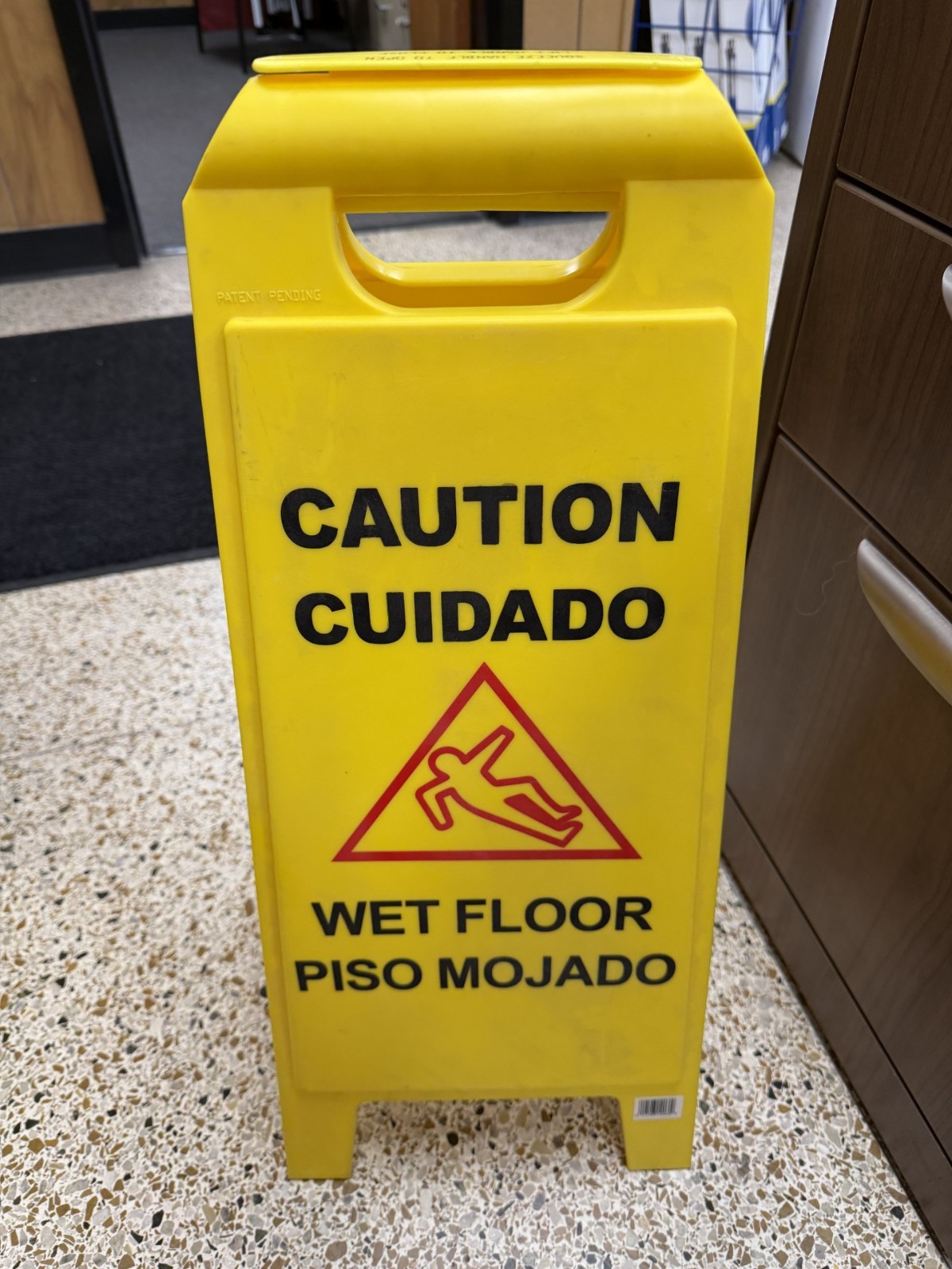 24 in. Yellow Bilingual Caution Wet Floor Sign